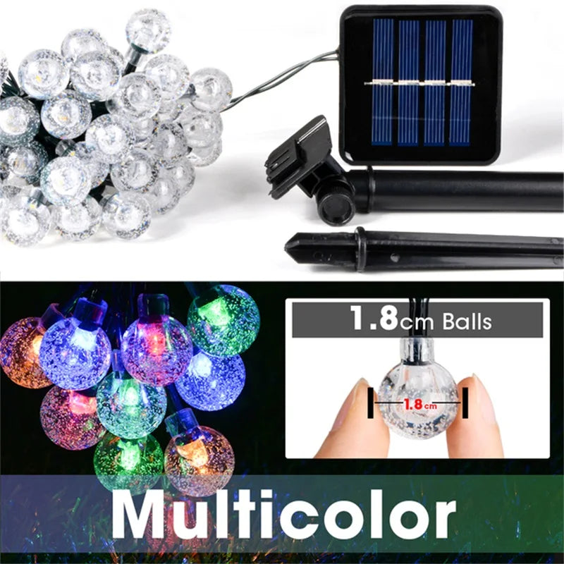 Tira de Luces LED Solares – Decoración Navideña y de Jardín con 200 Esferas Brillantes y Florcitas Impermeables